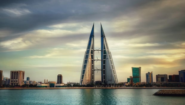 The image showcases Bahrain World Trade Center, highlighting its impressive height and architecture.